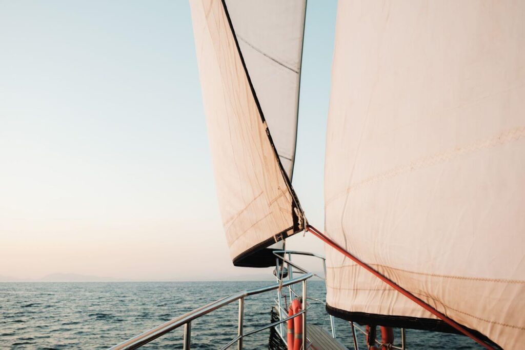 Beautiful sailing of a sailing yacht during the golden hour at sea
