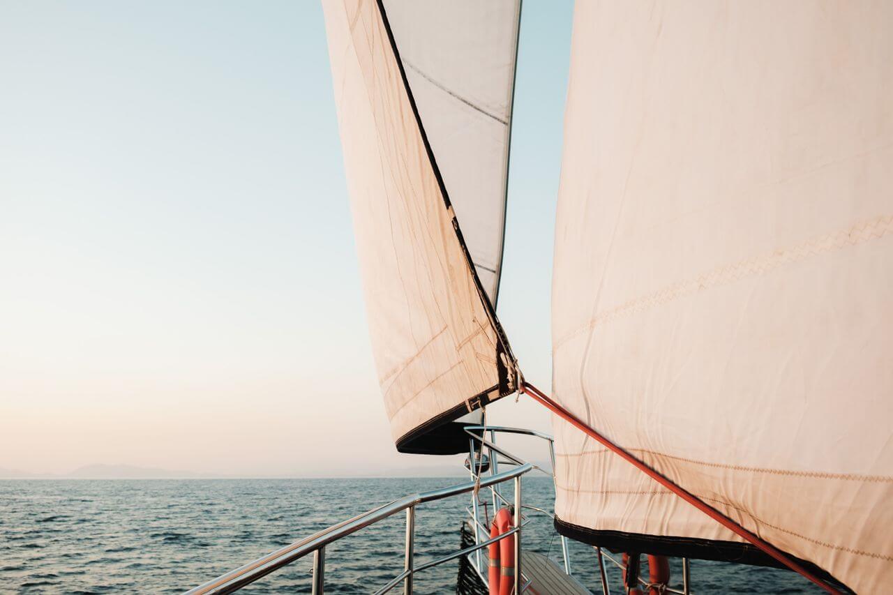 Sailing Holiday Beautiful sailing of a sailing yacht during the golden hour at sea